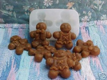 https://www.vanyulay.com/wp-content/uploads/2015/08/Gingerbread-Man-and-Gal-Embeds-2-Cavity-Silicone-Mold-5294.jpg